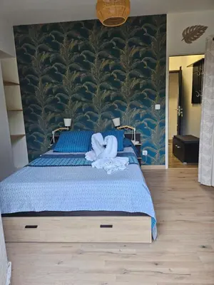 Un ou plusieurs lits dans un hébergement de l'établissement Les chambres d'Estelle