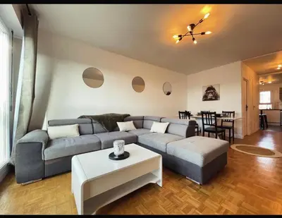 Coin salon dans l'établissement Le Bary - 10p - 100m2 - Gare - Parking Privé Gratuit