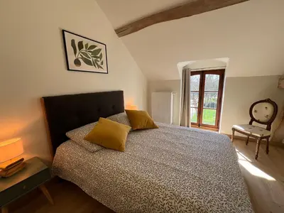 Un ou plusieurs lits dans un hébergement de l'établissement La Closerie – Château de Thésée
