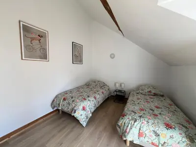 Un ou plusieurs lits dans un hébergement de l'établissement Chez Riton - Château de Thésée