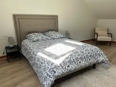 Un ou plusieurs lits dans un hébergement de l'établissement Chez Riton - Château de Thésée