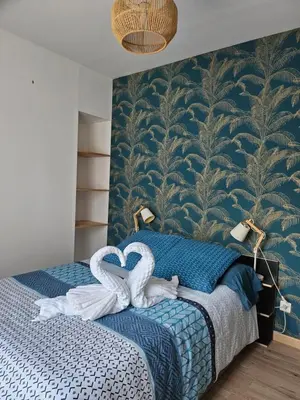 Un ou plusieurs lits dans un hébergement de l'établissement Les chambres d'Estelle