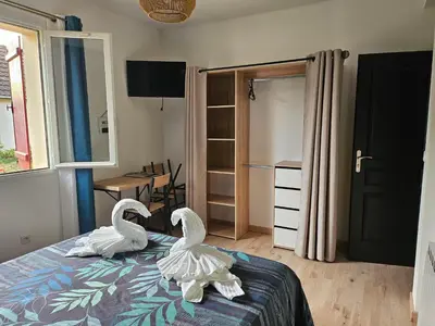 Un ou plusieurs lits dans un hébergement de l'établissement Les chambres d'Estelle