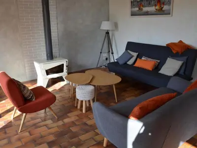 Coin salon dans l'établissement Maison spacieuse avec jardin, terrasse, et équipements de loisirs à Pouillé - FR-1-491-346