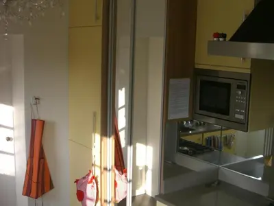 Cuisine ou kitchenette dans l'établissement Demeure de caractère avec charme ancien et modernité contemporaine - FR-1-491-347