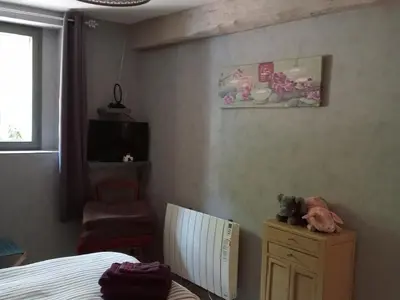Un ou plusieurs lits dans un hébergement de l'établissement Gîte cosy avec piscine chauffée près des sites touristiques et zoo de Beauval - FR-1-491-378