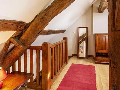 Un ou plusieurs lits dans un hébergement de l'établissement Gîte familial près des châteaux de la Loire avec jardin et jeux pour enfants - FR-1-491-390