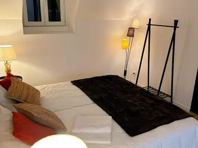 Un ou plusieurs lits dans un hébergement de l'établissement Gîte de charme avec piscine, animaux acceptés, idéal pour familles - FR-1-491-414