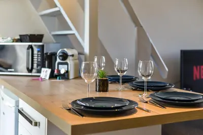 Cuisine ou kitchenette dans l'établissement Le Saint-Martin - Hypercentre - Netflix