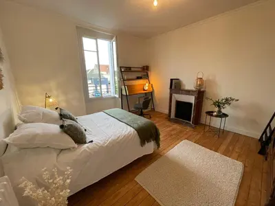 Un ou plusieurs lits dans un hébergement de l'établissement Maison Coeur centre ville Arnage 24h du Mans