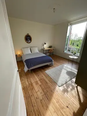 Un ou plusieurs lits dans un hébergement de l'établissement Maison Coeur centre ville Arnage 24h du Mans
