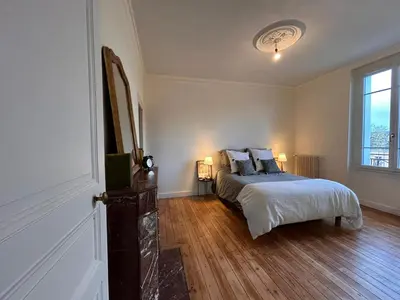Un ou plusieurs lits dans un hébergement de l'établissement Maison Coeur centre ville Arnage 24h du Mans