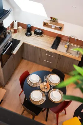 Cuisine ou kitchenette dans l'établissement Appartements plein centre, à 5 minutes du château