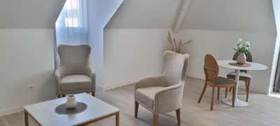 Coin salon dans l'établissement Résidence de Châtelleraut