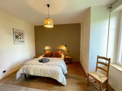 Un ou plusieurs lits dans un hébergement de l'établissement Gîte rénové avec billard, baby-foot, jardin clos, recharge VE, proche châteaux de la Loire - FR-1-381-575