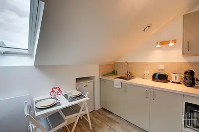 Cuisine ou kitchenette dans l'établissement Sakura - Face Gare