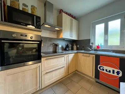 Cuisine ou kitchenette dans l'établissement Le Nid des Pilotes - Circuit Bugatti - Piscine - 4pers