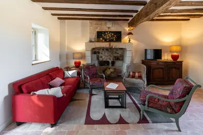 Coin salon dans l'établissement Le Puits Renaissance - Gîtes de caractère et piscine chauffée
