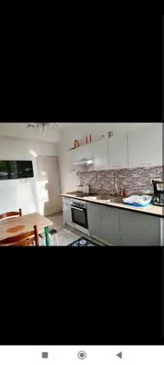 Cuisine ou kitchenette dans l'établissement Chez Paulette