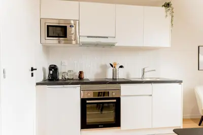 Cuisine ou kitchenette dans l'établissement Le Soft - Beau logement - Centre - Gare - Tram - Superbe vue Sarthe