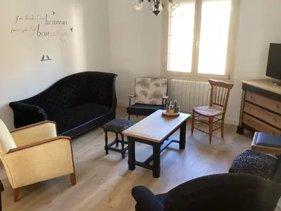 Coin salon dans l'établissement Superbe maison de famille