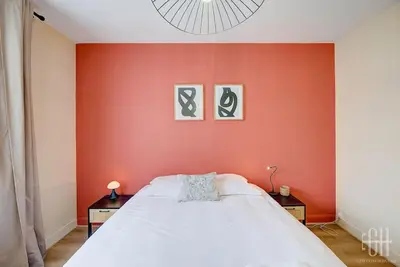 Un ou plusieurs lits dans un hébergement de l'établissement L'oeillet - Place Plumereau