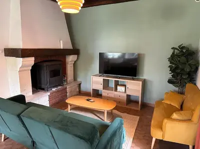Télévision ou salle de divertissement dans l'établissement Gîte des Fours à Chaux