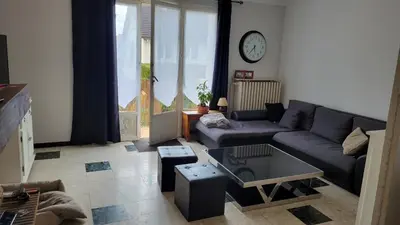 Coin salon dans l'établissement Maison 24h du Mans