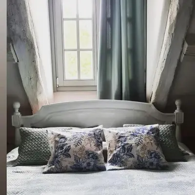 Un ou plusieurs lits dans un hébergement de l'établissement Duplex à colombages en bord de Loire à 2 pas du château de Blois