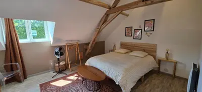 Un ou plusieurs lits dans un hébergement de l'établissement Gîte du bois Richer 4 étoiles 15 personnes avec piscine