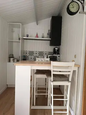 Cuisine ou kitchenette dans l'établissement Chez NATHALIE