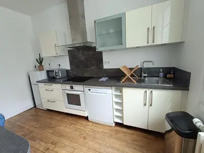 Cuisine ou kitchenette dans l'établissement T3 centre-ville avec parking
