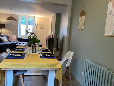 Coin salon dans l'établissement Maison Bollée 6 Pers moderne avec Jardin