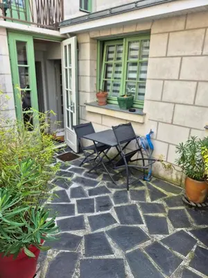 Balcon ou terrasse dans l'établissement Charmante maison