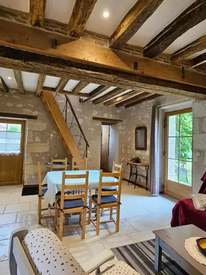 Coin salon dans l'établissement Moulin de Galerne, Le gite Du Four à Pain