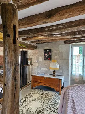 Un ou plusieurs lits dans un hébergement de l'établissement Moulin de Galerne, Le gite du Boulanger