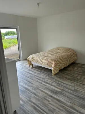 Un ou plusieurs lits dans un hébergement de l'établissement Maisons 50m2