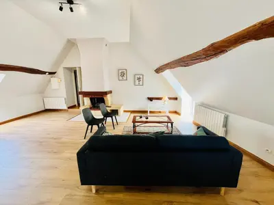 Coin salon dans l'établissement Centre-bourg, calme, familial, l'appart du Clocher