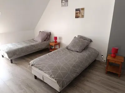Un ou plusieurs lits dans un hébergement de l'établissement gite de la grand maison les chênes