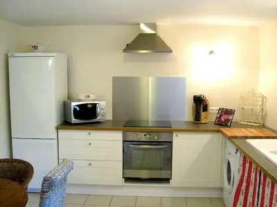 Cuisine ou kitchenette dans l'établissement Grand gîte, campagne, piscine et spa - Saumur