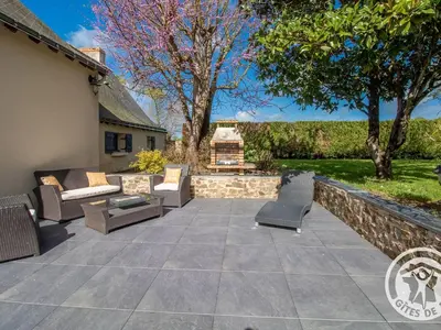 Jardin de l'établissement Gîte charmant avec jardin, proche activités nautiques - FR-1-622-75