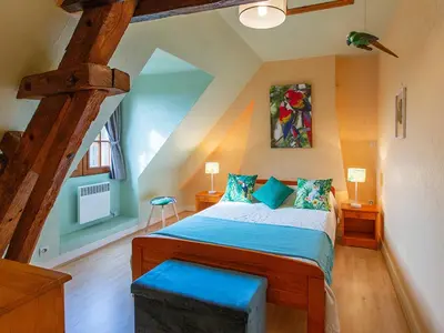 Un ou plusieurs lits dans un hébergement de l'établissement Gîte 4 chambres avec piscine couverte et jardin proche des châteaux de la Loire - FR-1-491-370