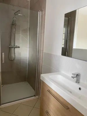 Salle de bains dans l'établissement L'Oasis