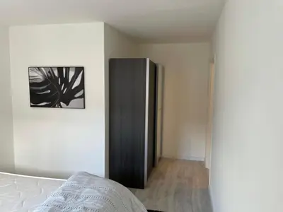 Un ou plusieurs lits dans un hébergement de l'établissement Appartement 24h du Mans