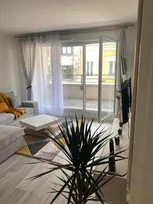 Un ou plusieurs lits dans un hébergement de l'établissement Appartement 24h du Mans