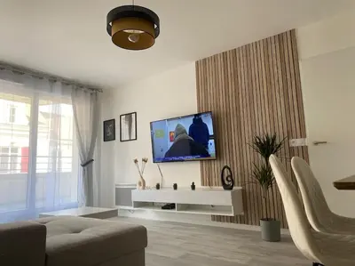 Télévision ou salle de divertissement dans l'établissement Appartement 24h du Mans