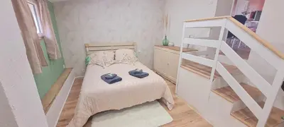 Un ou plusieurs lits dans un hébergement de l'établissement Maison campagne détente