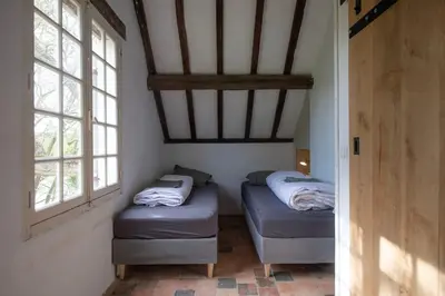 Un ou plusieurs lits dans un hébergement de l'établissement Huis op een eiland in de Loire