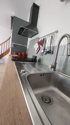 Cuisine ou kitchenette dans l'établissement Les hébergements vignerons de Pierre & Bertrand Couly