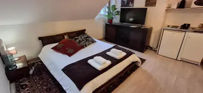 Un ou plusieurs lits dans un hébergement de l'établissement appartement chez Eric 7